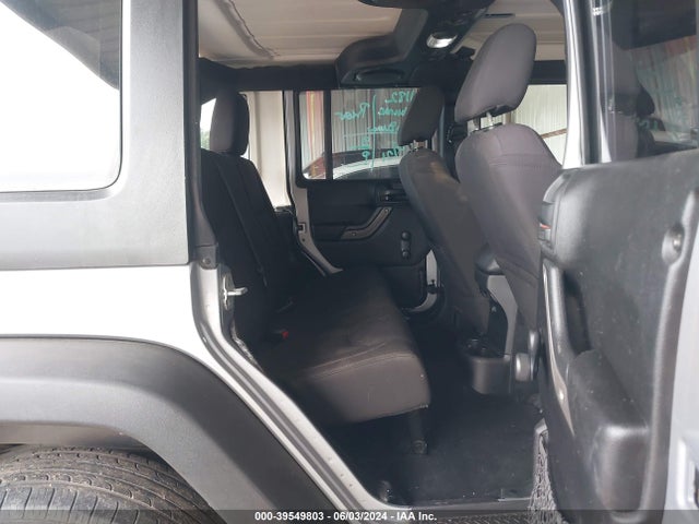 1C4BJWDG7EL130668 Jeep Wrangler Unlimited Sport