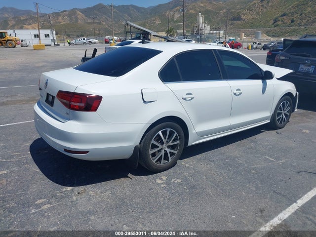 3VWDB7AJ0JM219189 Volkswagen Jetta 1.4t Se/1.4t Wolfsburg Edition