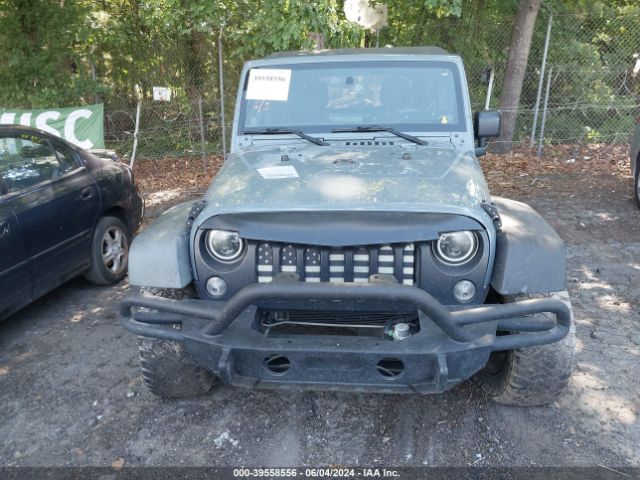 1C4BJWDG4EL252906 Jeep Wrangler Unlimited Sport