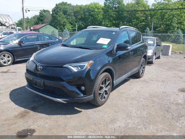 2T3JFREV9GW487555 Toyota RAV4 SE