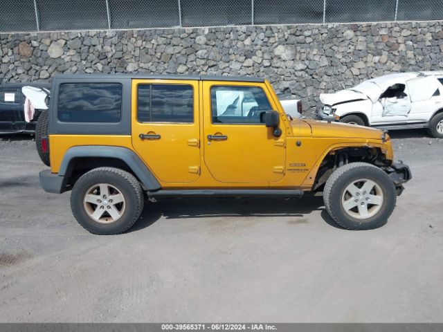 1C4BJWDG8EL250804 Jeep Wrangler Unlimited Sport