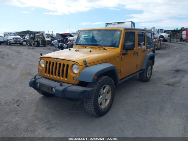 1C4BJWDG8EL250804 Jeep Wrangler Unlimited Sport