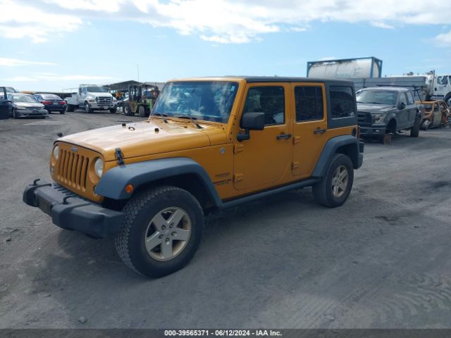 1C4BJWDG8EL250804 Jeep Wrangler Unlimited Sport