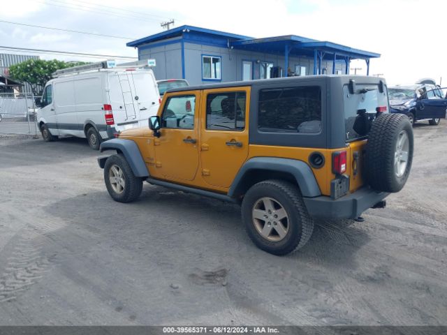 1C4BJWDG8EL250804 Jeep Wrangler Unlimited Sport