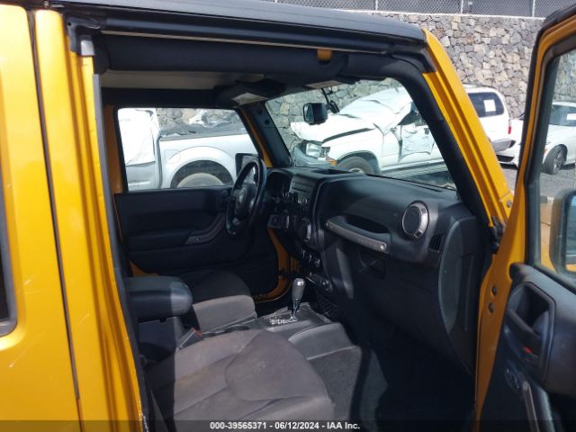 1C4BJWDG8EL250804 Jeep Wrangler Unlimited Sport