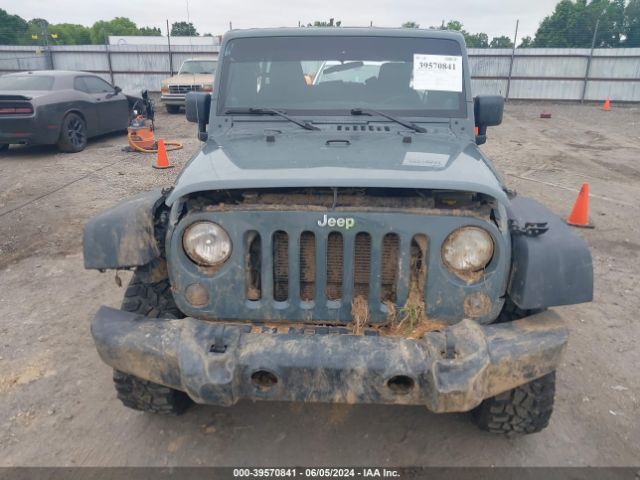 1C4BJWDG3EL264268 Jeep Wrangler Unlimited Sport