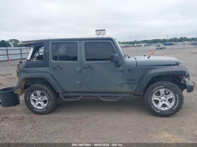 1C4BJWDG3EL264268 Jeep Wrangler Unlimited Sport