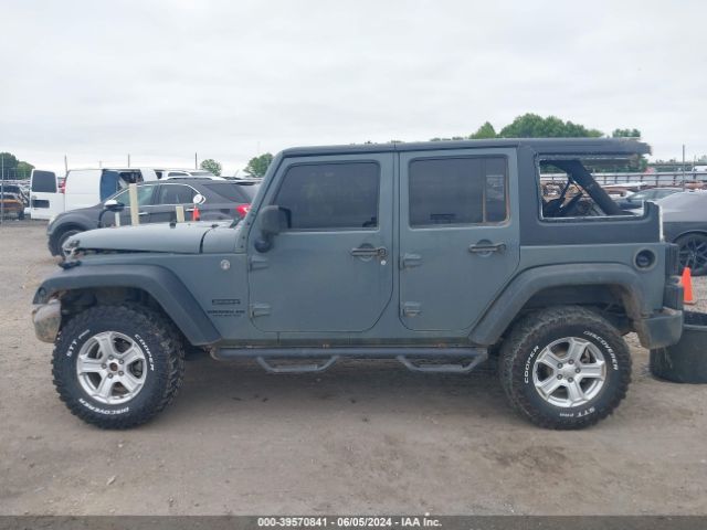 1C4BJWDG3EL264268 Jeep Wrangler Unlimited Sport