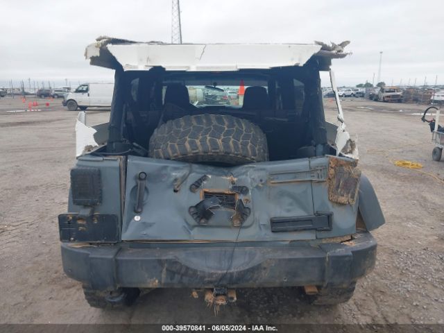 1C4BJWDG3EL264268 Jeep Wrangler Unlimited Sport
