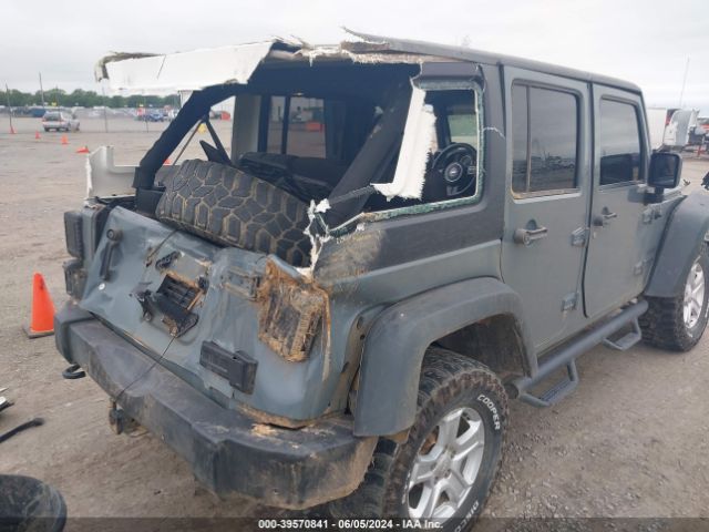 1C4BJWDG3EL264268 Jeep Wrangler Unlimited Sport