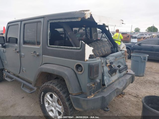 1C4BJWDG3EL264268 Jeep Wrangler Unlimited Sport