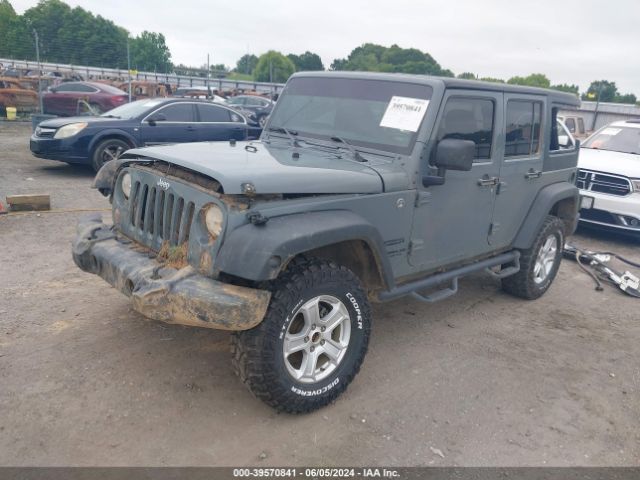 1C4BJWDG3EL264268 Jeep Wrangler Unlimited Sport