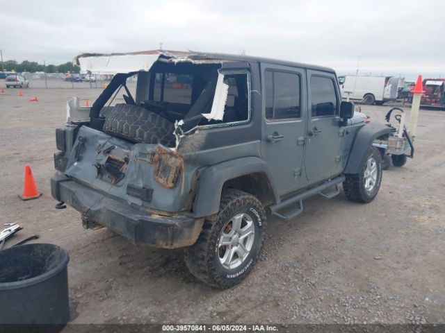 1C4BJWDG3EL264268 Jeep Wrangler Unlimited Sport