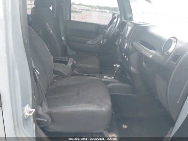 1C4BJWDG3EL264268 Jeep Wrangler Unlimited Sport