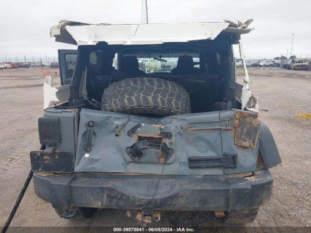 1C4BJWDG3EL264268 Jeep Wrangler Unlimited Sport