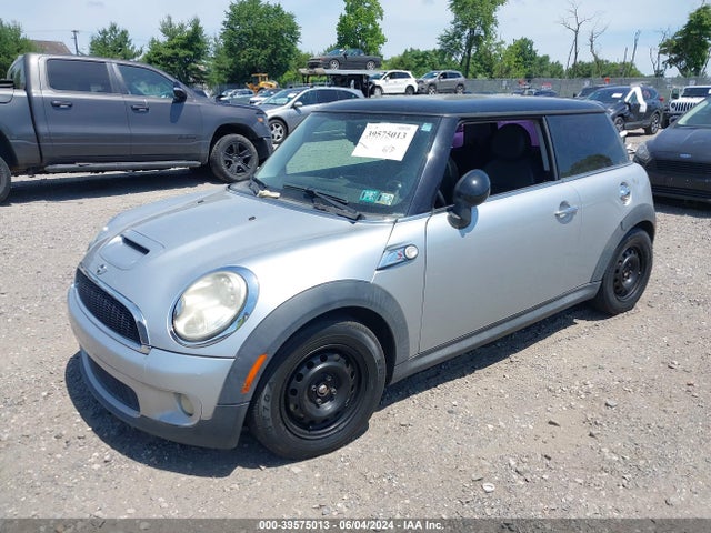 2009 MINI COOPER S WMWMF73539TW87693 Photo 1