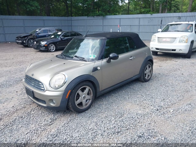 2009 MINI COOPER WMWMR33559TU95255 Photo 1