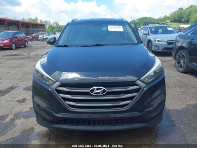 KM8J3CA46GU023537 Hyundai TUCSON SE
