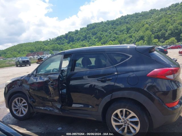 KM8J3CA46GU023537 Hyundai TUCSON SE
