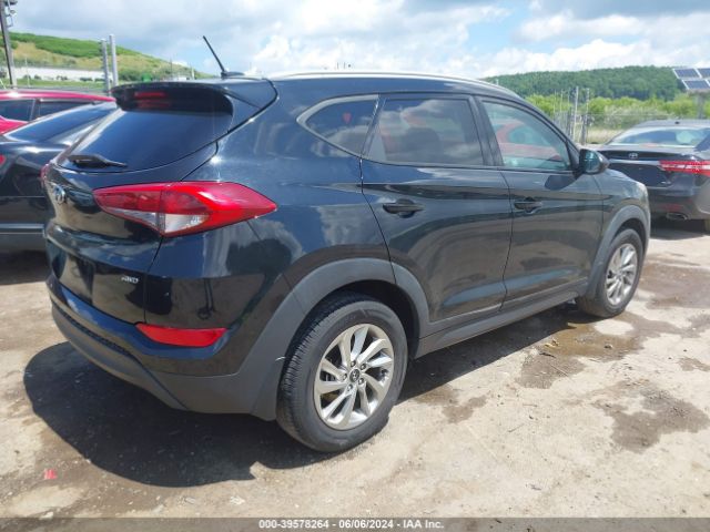 KM8J3CA46GU023537 Hyundai TUCSON SE