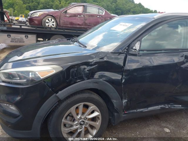 KM8J3CA46GU023537 Hyundai TUCSON SE
