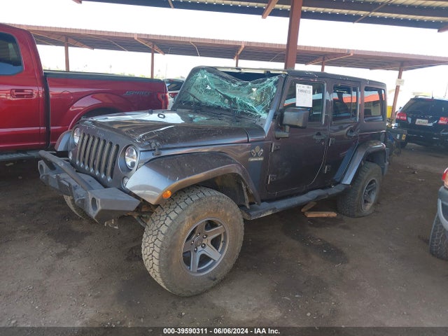 1C4BJWDG9GL167563 Jeep Wrangler Unlimited Freedom