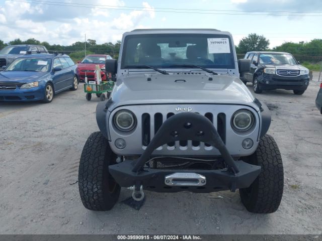 1C4BJWDG2EL129427 Jeep Wrangler Unlimited Sport