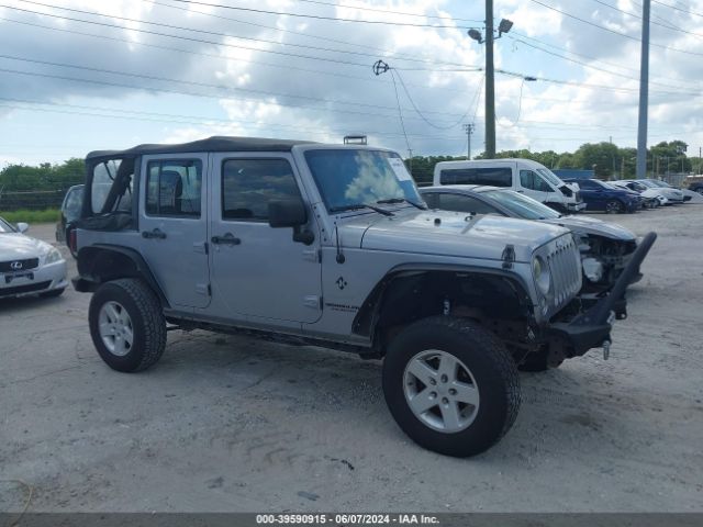 1C4BJWDG2EL129427 Jeep Wrangler Unlimited Sport