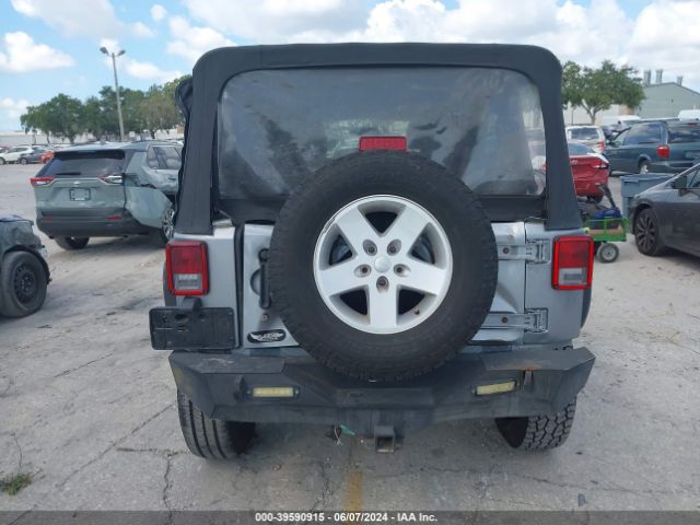 1C4BJWDG2EL129427 Jeep Wrangler Unlimited Sport