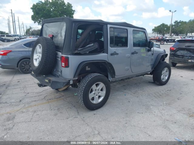 1C4BJWDG2EL129427 Jeep Wrangler Unlimited Sport