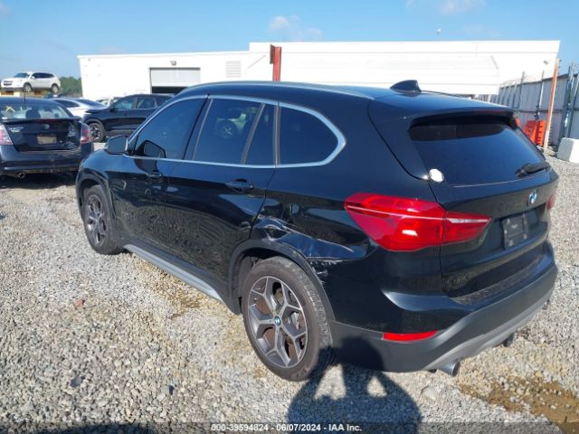 2018 BMW X1 WBXHT3C35J5L24828 Photo 2