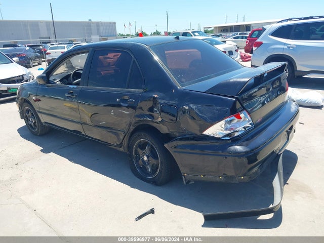 2002 MITSUBISHI LANCER JA3AJ86EX2U070666 Photo 2