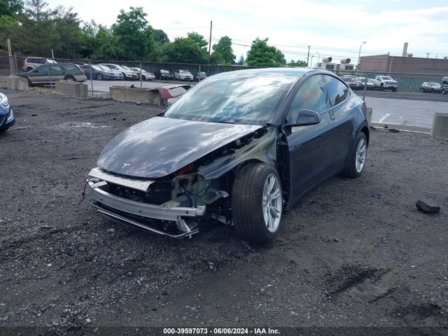 2024 TESLA MODEL Y 7SAYGAEE8RF059937 Photo 1