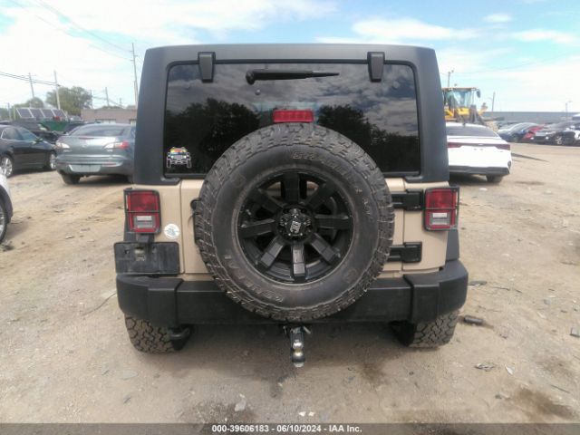 1C4BJWDG5GL312646 Jeep Wrangler Unlimited Sport
