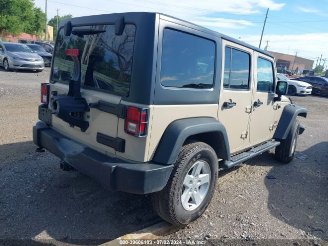 1C4BJWDG5GL312646 Jeep Wrangler Unlimited Sport