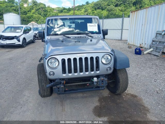 1C4AJWAG9GL108416 Jeep Wrangler Sport