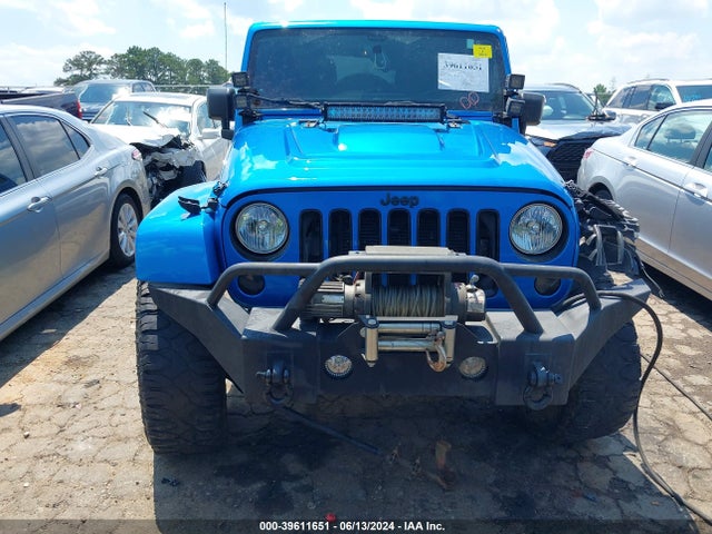 1C4BJWEG3EL168283 Jeep Wrangler Unlimited Polar Edition