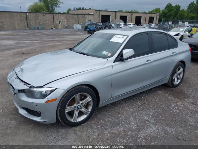 2013 BMW 320I WBA3C3C54DF979907 Photo 1