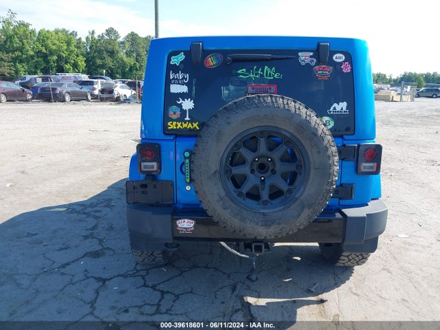 1C4HJWEG4EL159022 Jeep Wrangler Unlimited Polar Edition