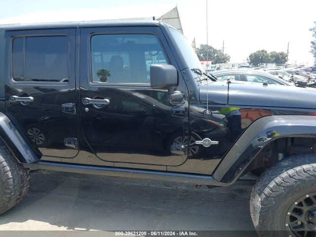 1C4BJWDG8EL241617 Jeep Wrangler Unlimited Freedom Edition