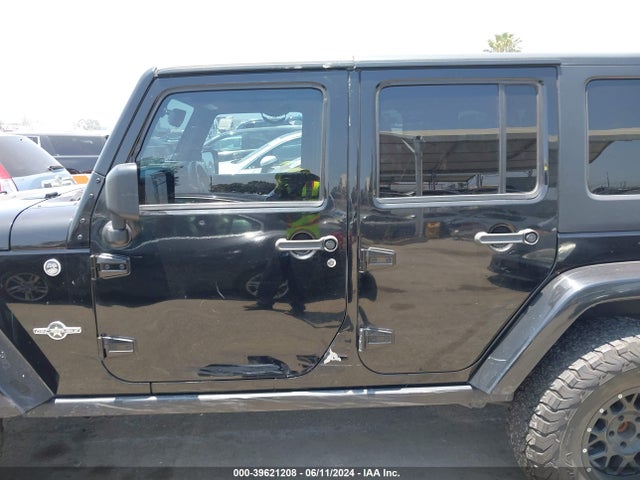 1C4BJWDG8EL241617 Jeep Wrangler Unlimited Freedom Edition