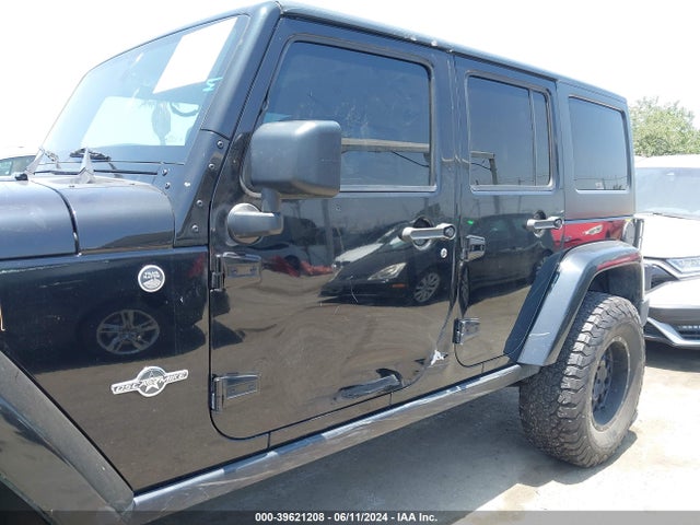 1C4BJWDG8EL241617 Jeep Wrangler Unlimited Freedom Edition