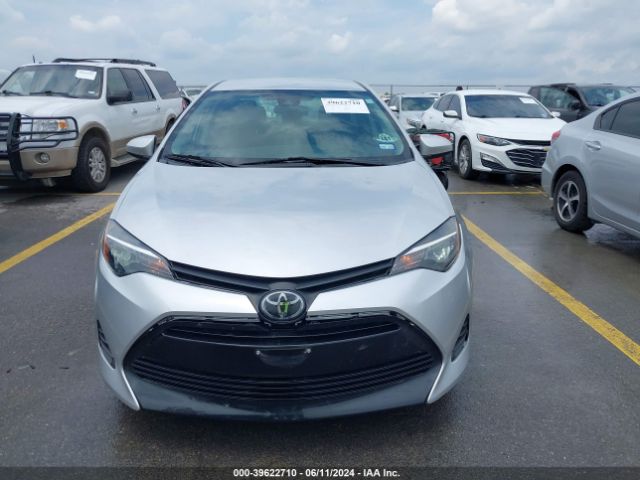 2T1BURHE2KC235977 Toyota COROLLA LE
