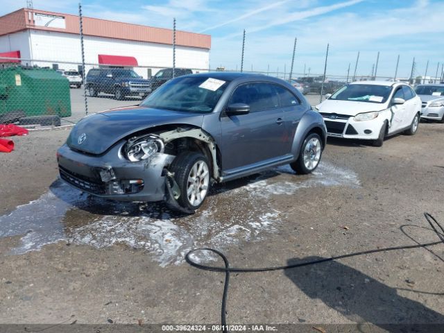 3VWJX7AT1EM631987 Volkswagen Beetle 2.5l