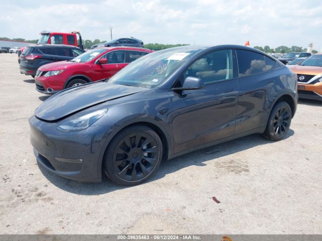 2024 TESLA MODEL Y 7SAYGAEE8RF030910 Photo 1
