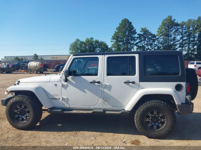 1C4BJWEG5EL233697 Jeep Wrangler Unlimited Sahara