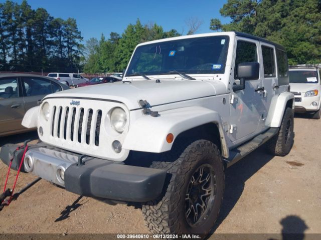 1C4BJWEG5EL233697 Jeep Wrangler Unlimited Sahara