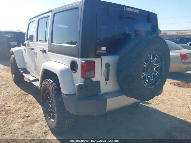 1C4BJWEG5EL233697 Jeep Wrangler Unlimited Sahara