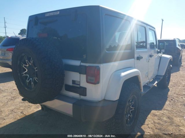 1C4BJWEG5EL233697 Jeep Wrangler Unlimited Sahara