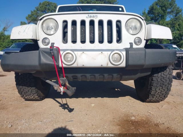 1C4BJWEG5EL233697 Jeep Wrangler Unlimited Sahara